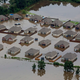 Flooded homes in Hammond, Louisiana on Saturday, August 13. Image via AP.